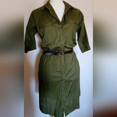 Army Green Shirt Dress... So Cute! Great Fall Color.. Such A Clean And Sophisticated Look. 3/4 Sleeves With Button And Strap Detailing. Brown Belt Buttons Down The Front.. Size S.. New With Tags. 97% Cotton 3% Spandex Casual Half Sleeve Shirt Dress With Button Closure, Casual Half Sleeve Shirt Dress With Buttons, Chic Button-up Shirt Dress With Rolled Sleeves, Casual Half Sleeve Office Dresses, Casual Dress With 3/4 Roll-up Sleeves, Casual Dresses With 3/4 Roll-up Sleeves, Casual Dress With Roll-up 3/4 Sleeves, Casual Dresses With Roll-up 3/4 Sleeves, Summer Workwear Shirt Dress With 3/4 Sleeves