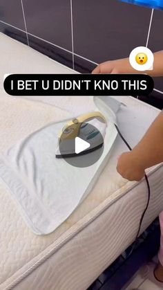 a person is ironing on a mattress with an iron in front of it and the caption reads, i bet u didn't know this