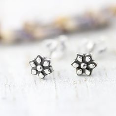 { P r o d u c t } A pair of tiny flower stud earrings in a mandala style { M a t e r i a l s } - sterling silver { D i m e n s i o n s } - 5mm x 5mm { S h i p p i n g } - Canada: We offer free shipping on all jewelry orders, however please note that we ship via regular mail, so there is no tracking number. You may upgrade your shipping method at checkout. - USA: All jewelry orders are shipped with a tracking number. USD $35+ orders ship free! { P o l i c i e s } Don't forget to take a look at ou Mandala Flower, Flower Stud, Flower Mandala, Tiny Flowers, Flower Earrings Studs, Flower Studs, Sterling Silver Earrings, Tracking Number, Silver Earrings