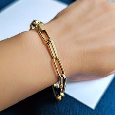 14K Solid Gold Paperclip Chain Bracelet, Rectangle Long Chain, Chunky Chain Link Bracelet, Stacking Bracelet, Unisex Chain, Gift For Her Him P E R S O N A L I Z E D ∙ J E W E L R Y ❤ Handmade with love ❤ 🧿 Welcome to GDjeweltr. All our jewelery is made by handmade in our workshop as custom. The most unique gift you can find for you and your loved ones ♥ Please take a look my store to see our handmade necklaces, rings, earrings and bracelets collection. ⭐ Item Details: * Material: 14K Solid Gold Modern Chain Bracelet With Rectangular Links And Box Clasp, Modern Link Chain Bracelet With Box Clasp, Modern Chain Bracelet With Box Clasp For Gift, Chain Link Bracelet With Box Clasp As Gift, Chain Link Bracelet With Box Clasp For Gift, Modern Rectangular Paperclip Chain Bracelet, Modern Rectangular Gold Bracelet With Box Chain, Rectangular Gold Bracelet, Gold Chain Bracelet With Box Clasp And Rectangular Links