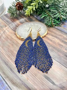 Magical beautiful blue and gold celestial fringe  earrings. Handmade from best Javanese beads. Light weight and great addition to any occasion ✨ Cheap Blue Beaded Fringe Earrings, Blue Beaded Earrings With Gold Beads For Festivals, Pearls Jewelry Diy, Earrings Beads, Earrings Moon, Beaded Fringe Earrings, Beaded Earring, Beading Crafts, Brick Stitch Pattern