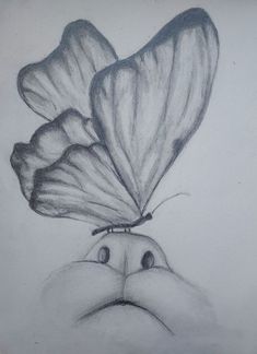 a pencil drawing of two butterflies on top of each other's head with eyes