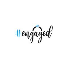 the word engaged written in black and blue ink with a diamond ring on top of it