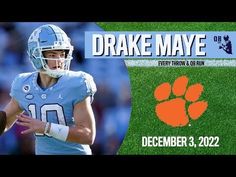 a football player holding a ball in his hand with the words duke maye on it