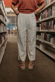 The Mindie Slouchy Linen Pants in Cream are the ultimate in comfort and style. Made with airy linen, these pants feature an elastic waist and front pockets for added convenience. The slouchy fit and wide leg give off a cool and casual vibe, perfect for any laid-back look. Paired with THE STRAWBERRY FESTIVAL TEE IN PINK, THE TRUDIE TOP IN TERRACOTTA & THE MERELL PLATFORM SANDALS IN SAND Elastic waist Wide leg Slouchy fit Functional pockets 70% Viscose, 30% linen Inseam: Small: 25" Medium: 25.5" L Happy Threads, Summer Goddess, Strawberry Festival, Pink Desert, Exclusive Clothing, Swim Bottoms, British Indian, Linen Pants, Platform Sandals