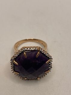 Vintage Ring golden 925 Sterling Silver Unusual Deep Toned amethyst surrounded by clear crystals 925 Sterling Filigree Setting Handmade Can be resized My jeweler charges $10-$20 All rings are shipped free in the US in a nice gift box. Check out our over a THOUSAND great reviews!!! Engraving is $4 per letter and is not always perfect depending on the piece. It can take a few days if the jeweler is busy. This is payable to Paypal Judithsltd@gmail.com Elegant Faceted Amethyst Ring In Yellow Gold, Formal Faceted Amethyst Ring Fine Jewelry, Elegant Gold Amethyst Diamond Ring, Elegant Yellow Gold Crystal Amethyst Ring, Elegant Yellow Gold Amethyst Crystal Ring, Elegant Gold Amethyst Ring With Faceted Cut, Elegant Gold Faceted Amethyst Ring, Elegant Gold Amethyst Ring With Faceted Detail, Formal Faceted Diamond Rings