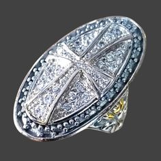 Gorgeous Large Ladies Statement Ring Dazzles With A Beautiful Cross In An Oval Shaped Setting Embellished With Cubic Zirconia Stones And Finished With Touches Of 14k Gold. Details: Stamped 925 14k Gold Filled Accents. Nwt Ladies Size 7.5 Approximately. (Large Rings Tend To Fit Snugger). Please See Photos For Additional Details. Product Color May Differ Slightly From Photos Due To Differences In Color Monitors And Lighting. Smoke Free Home. Will Be Packaged And Shipped With Care. Bundle Your Favo Sterling Silver Rhinestone Rings For Anniversary, Sterling Silver Rings With Rhinestones, White Gold Rings With Rhinestones As Gift, Silver Sterling Silver Ring With Rhinestones, Sterling Silver Rhinestone Ring, Silver Crystal Ring With Pave Setting, Classic Anniversary Rings With Rhinestones, Classic Sterling Silver Jewelry With Rhinestones, Silver Oval Rings With Diamond Accents