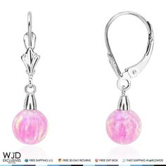 These cute dangle drop leverback earrings are designed with 7 mm ball shaped pink fire opal stones fashioned in 14K solid white gold. Size: one size.  Color: Silver.  Gender: female.  Age Group: adult. Pink Opal Drop Earrings, Elegant Pink Nickel-free Chandelier Earrings, Artistic Pink Nickel-free Earrings, Nickel-free Pink Novelty Earrings, Pink Opal Earrings, Pink Fire, Gold Branding, Leverback Earrings, Stone Cuts