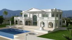 a large white house with a pool in the front yard