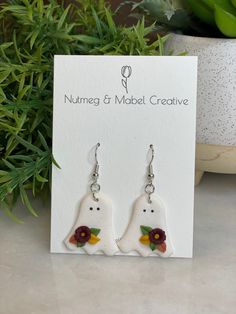 Fall Floral Ghost Polymer Clay Dangle Earrings Approximately 2 inch drop Ghosts are approximately 1 inch x 1 inch Whimsical Hypoallergenic Dangle Earrings, White Novelty Drop Earrings, Novelty White Drop Earrings, White Novelty Dangle Jewelry, Novelty White Dangle Jewelry, Cute White Hoop Earrings For Gifts, Novelty White Dangle Earrings, Novelty White Earrings As A Gift, Novelty White Earrings For Gifts