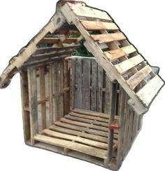 a small wooden house made out of pallets