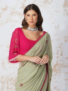 Semi Sheer georgette saree embroidered with pink beads butas and detailed with a contrasting lace. It comes with an unstitched, hotpink georgette blouse piece with beadwork. Color: Sage Green Fabric: Gerogette Note: Wash Care - Dry Clean only The product will be delivered within 3-4 weeks of order placed Relaxed Fit Pista Green Georgette Blouse With Dupatta, Pink Embellished Blouse With Traditional Drape, Embellished Pista Green Georgette Pre-draped Saree, Embellished Pista Green Pre-draped Saree In Georgette, Pista Green Georgette Blouse With Traditional Drape, Designer Pista Green Georgette Blouse, Pista Green Georgette Blouse For Wedding, Pista Green Pre-draped Georgette Saree With Mirror Work, Pink Blouse With Mirror Work For Eid