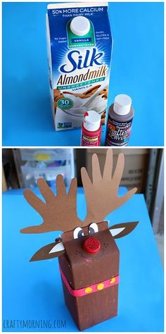 a cardboard box with a reindeer's head on it and a carton of milk in the background