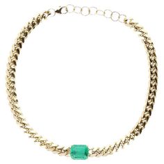 Featured here is a 10-carat stunning, East to West emerald choker necklace in 14K yellow gold. Displayed in the center is a natural emerald Colombian emerald accented by a simple prong setting, allowing for the emerald to be shown in full view. The earth-mined Muzo emerald has a desirable lush green color with excellent qualities. A 13-15 inch solid gold cuban link chain is attached to the emerald pendant. Setting Style: Bezel Setting Material: 14K Yellow Gold Chain Lenght: 13-15 inches, Adjusta Cuban Link Choker, Emerald Choker, Gold Cuban Link Chain, Cuban Link Necklace, Diamond Tennis Necklace, Clover Necklace, Colombian Emeralds, Solitaire Necklaces, Emerald Pendant