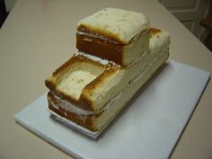 two slices of cake sitting on top of a white plate