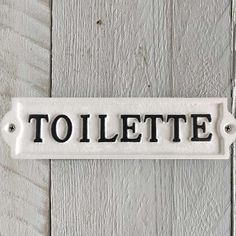 a sign that says toilette on it