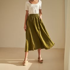 "SINEAD is the best way to celebrate your unique style. FEATURES: * elastic waistline * handy side pockets * skirt length is 92 cm / 36,2\" (size S) * 100 % natural, certified linen fabric * dyed and washed in small batches * natural cotton yarns * handmade at a small studio in Europe COLORS: Dyed and washed in small batches, so the color will be unique and superb quality to each piece. Please check the color options on the side menu. SIZE GUIDE / BODY MEASUREMENTS: XS Bust 28- 31\" (72- 80 cm) Summer Linen Maxi Skirt With Elastic Waistband, Bohemian Linen Maxi Skirt For Spring, Bohemian Long Linen Maxi Skirt, Spring Bohemian Linen Maxi Skirt, Bohemian Linen Maxi Skirt, Flowy Linen Bohemian Maxi Skirt, Bohemian Flowy Linen Maxi Skirt, Bohemian Linen Tiered Maxi Skirt, Bohemian Linen Relaxed Skirt Bottoms