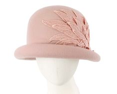 Blush pink cloche made from pure wool felt and decorated with luxurious lace. This hat features unique upturned brim and will be a perfect addition to your next fashion winter outfit.  Made in Australia  Cloche hat  Felt winter hat  Fits up to 58cm Winter Felt Cloche Hat With Flat Brim, Winter Party Wool Cloche Hat, Wool Cloche Hat For Party, Spring Formal Cloche Felt Hat, Formal Spring Cloche Felt Hat, Chic Spring Felt Cloche Hat, Pink Fitted Mini Hat For Winter, Fitted Pink Mini Hat For Winter, Pink Brimmed Felt Hat