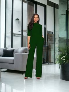 Fitted Green Jumpsuit With Pockets, Green Long Sleeve Pantsuit With Pockets, Elegant Solid Jumpsuits And Rompers With Pockets, Green Stretch Jumpsuits And Rompers For Workwear, Fitted Solid Color Pantsuit With Pockets, Green Fitted Jumpsuits And Rompers For Work, Chic Workwear Jumpsuits And Rompers With Side Pockets, Fitted Green Overalls For Workwear, Fitted Green Jumpsuits And Rompers For Work