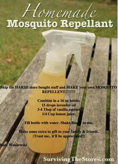 a bottle of homemade mosquito repellent sitting on top of a wooden picnic table