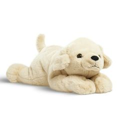 a white stuffed animal laying on its side