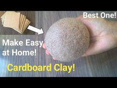 a person is holding a rock with the words, make easy at home cardboard clay