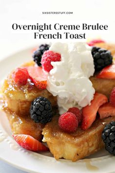 overnight creme brule french toast topped with berries and whipped cream on a white plate