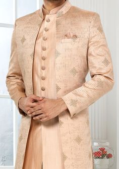 Readymade Art Silk Sherwani, and Jacket. Art Dupion Aligarhi Ready Made Trouser. Resham, Sequences, and Zari Work. Crafted in Chinese Collar Neck, and Full Sleeve. Faux Satin Lining with Plain Work. High-Quality Matching Buttons. Please Note: The footwear shown in the picture is for presentation and photography purpose only. Color: There might be slight color variation due to lightings and flashes while photo shooting. The color may also vary because of different screen resolutions. Wash Care: D Western Party Wear, Suit With Jacket, Indo Western Sherwani, Jacket Art, Indian Groom Wear, Western Party, Chinese Collar, Readymade Saree, Indian Groom