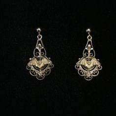 These are Victorian style filigree drops with a gold brass bat hang from a gold filled post earring. The delicate, gold plated, open work earrings have great detail including three tiny seed pearls. They are very lightweight and drop to about 1.25 inches.  The tiny bat added to the circa 1950's earrings measure a little under .5 inch. This piece of jewelry is sent in a bubble pack envelope via US postal service, first class mail with insurance and packed in a gift box. International rate is $23. Gothic Gold Jewelry For Formal Occasions, Elegant Metal Earrings For Halloween, Ornate Dangle Jewelry For Evening, Gold Gothic Jewelry For Formal Occasions, Gothic Formal Earrings For Pierced Ears, Gothic Pierced Jewelry For Wedding, Gold Jewelry For Halloween, Victorian Filigree Dangle Jewelry, Vintage Gold Jewelry For Halloween