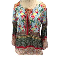 Brand: Anthropologie- Fig & Flower Style: Boho 3/4 Sleeve Blouse Color: Multicolored Size S Material: 100% Polyester Measurements: Pit To Pit 20”, Length 24” Features: Front Laced Up. Floral Print. Condition: Nwot Note: Please View All Pictures For Details And Condition. Bohemian Spring Tops With 3/4 Sleeves, Spring Long Sleeve Blouse With Floral Patchwork, Casual Multicolor Blouse With Floral Patchwork, Long Sleeve Blouse With Floral Patchwork For Spring, Bohemian Blouse With 3/4 Sleeve Floral Print, Multicolor 3/4 Sleeve Vacation Blouse, Multicolor 3/4 Sleeve Blouse For Vacation, Bohemian Floral Print Top With 3/4 Sleeves, Summer Multicolor Blouse With Floral Patchwork