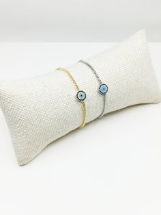 Evil eye bracelet is adjustable, it fits on any wrist easily. Evil eye is made of zircon. It is shinny and beautiful. This nazar jewelry would be a great gift choice for birthday, valentine's day or Christmas. Dainty evil eye bracelet is suitable for women wearing on daily or special occasions. For more evil eye bracelets, click the link below; https://www.etsy.com/shop/EyeDesignsbyGG?ref=search_shop_redirect&section_id=30219689 Adjustable Evil Eye Jewelry In Cubic Zirconia, Adjustable Blue Round Tennis Bracelet, Adjustable Blue Tennis Bracelet, Adjustable Cubic Zirconia Evil Eye Bracelet Gift, Evil Eye Bracelets With Cubic Zirconia As Gift, Evil Eye Cubic Zirconia Bracelets As Gift, Adjustable Round Chain Bracelet With Evil Eye, Nazar Jewelry, Blue Eye Bracelet