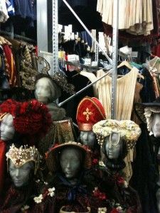 several mannequins dressed in costumes and headdresses are on display