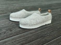 These sporty shoes are made from 100% natural wool. Boiled wool clogs are felted using only water and natural olive oil soap. Very flexible and grippy sports soles soles are are stitched and glued to the clogs . Felted wool shoes are very warm, soles makes them suitable for outside wearing. 100% wool felt is breathable, provides natural insulation, keeps your feet warm and cozy. Choose you size according to our sizing chart in picture 5. First photo is of cappuccino shoes. Subscribe to our Woole Felt Slip-on Clogs With Rubber Sole, Felt Clogs With Rubber Sole And Round Toe, Felt Clogs With Rubber Sole Slip-on, Slip-on Felt Clogs With Rubber Sole, Wool Clogs, Sporty Shoes, Wool Shoes, Beige Sneakers, Felt Shoes