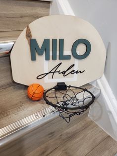 These custom made basketball signs are such a cute addition to any bedroom for a fan of the sport  they are made of Baltic Birch & Aspen, with a natural wood base, hand painted target square, up to two 3D names in the choice of your colours and fonts, a black hoop with a choice of a traditional or matching net   📏 Sizing The base is 1/4" thick, and the wood letters are 1/8- 1/4" thick depending on the font  the sign comes in 2 size options you can select from the drop down on the listing page Neutral Basketball Room, Wood Basketball Hoop, Basketball Nursery Theme, Basketball Hoop Decor, Basketball Nursery Baby Boy, Toddler Boy Sports Room, Little Boys Room Decorating Ideas, Boys Basketball Bedroom Ideas, Toddler Sports Bedroom