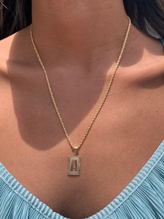 "18kt Gold Filled Initial Charm Necklace Chain Options and Lengths are available below. Chain thickness is between 2-2.5mm. For KIDS: We recommend 16\" For MEN: We recommend 24\" Chain can have a .5\" variation. Please size up if necessary. Top to Bottom: Option 1: Curb Chain Option 2: Rope Chain Option 3: Mariner Link Material: 18 Karat Gold Filled, Hypoallergenic. Tarnish Resistant. Gold-filled does not de-laminate or peel like Gold plated Jewelry nor does it tarnish as readily as silver. Gene Luxury Gold Rectangular Necklace, Rectangular Gold Plated Jewelry For Gifts, Rectangular Gold Plated Jewelry Gift, Gold Rectangular Pendant Jewelry For Anniversary, Gold Nameplate Jewelry With Box Chain, Gold Rectangular Necklace For Anniversary, Rectangular Gold Plated Box Chain Jewelry, Gold Rope Chain Jewelry As A Gift, Personalized Yellow Gold Jewelry With Rectangular Shape