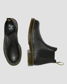 Slip-resistant Round Toe Boots For Streetwear, Classic Boots With Slip-resistant Round Toe, Leather Boots With Round Toe And Secure Fit, Classic Slip-resistant Boots With Round Toe, Leather Boots With Secure Fit And Round Toe, Leather Boots With Slip-resistant Secure Fit, Chelsea Boots Style, Black Dr Martens, Black Industrial