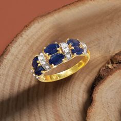 Ross-Simons - 2.80ct t. w. Sapphire Ring, Diamond Accents in 14kt Yellow Gold. Size 9. This polished 14kt yellow gold ring hosts pairs of 2.80 ct. t. w. oval sapphires that are gorgeously sectioned between rows of diamond accents set in white rhodium. 3/8" wide. Sapphire ring. Sapphire birthstones are the perfect gift for September birthdays. Dazzling Yellow Gold Sapphire Ring With Brilliant Cut, Dazzling Yellow Gold Sapphire Ring, Yellow Gold Cluster Sapphire Ring With Brilliant Cut, Yellow Gold Sapphire Cluster Ring With Brilliant Cut, Yellow Gold Sapphire Diamond Ring With Prong Setting, Dazzling Oval Yellow Gold Sapphire Ring, Fine Jewelry Yellow Gold Sapphire Ring With Prong Setting, Yellow Gold Sapphire Ring With Prong Setting, Yellow Gold Sapphire Cluster Ring With Diamond Accents