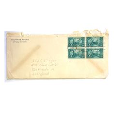 an old envelope with stamps on it