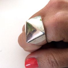 A world in balance This is a unique pyramid sterling silver ring. Shiny silver and clean lines. (code-R2180). © 2011 Artisanimpact Inc. All rights reserved. Construction & Dimensions: Sterling silver. Approximate width 18mm (0.70in) length 22mm (0.86) We can make any size, including quarter sizes. Please choose your size in the drop down menu, when you check out. About our jewelry Artisanimpact features a variety of brass, silver and 14k gold jewelry. Ancient coins in great settings, Hand st Modern Silver Ring, Statement Rings Unique, Unique Silver Rings, Triangle Ring, Bohemian Ring, Geometric Ring, Statement Ring Silver, Bohemian Rings, Modern Ring