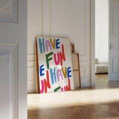 there is a sign that says have fun on the wall next to an open door