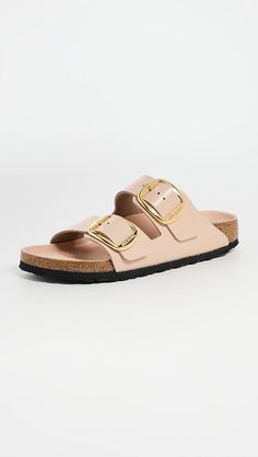 Birkenstock Arizona Big Buckle High Shine Sandals | Shopbop Gold Open Toe Slides With Buckle Closure, Leather Footbed Sandals With Gold Buckle For Spring, Spring Leather Sandals With Gold Buckle, Spring Slides With Gold Buckle And Open Toe, Open Toe Slides With Gold Buckle For Spring, Spring Open Toe Slides With Gold Buckle, Casual Gold Slides With Buckle Closure, Gold Flat Heel Sandals With Buckle Closure, Summer Footbed Sandals With Gold Buckle And Round Toe