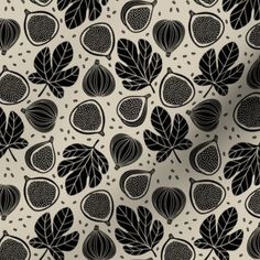 a black and white pattern with leaves