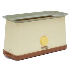 a white and brown toaster sitting on top of a counter