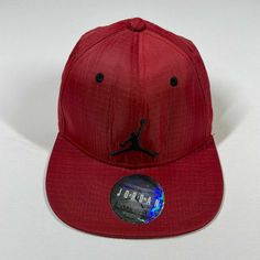 Jordan Snapback Hat Red Basketball Cap Jumpman Logo Youth One Size Adjustable Nice logo. Well cared for hat with plenty of life left. All of our items are clean, carefully inspected and we do our best to identify any and all defects. If you are unhappy with an item or it's not the perfect fit, we offer free returns. Item must be sent back in the same condition it was received. Hat will ship the next business day or sooner in a box to prevent damage in transit. Please let us know if you have any Red Flat Cap For Sports, Red Sports Flat Cap, Red Snapback Flat Cap For Sports, Red Flat Cap Fitted Hat For Streetwear, Red Adjustable Casual Fitted Hat, Casual Red Adjustable Fitted Hat, Red Casual Fitted Hat, University Red Adjustable Snapback Hat, Adjustable University Red Snapback Hat