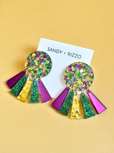 Purple, green, and gold glitter acrylic topper with dangles of mirrored purple, green glitter, and gold glitter. The perfect earring to celebrate Mardi Gras! *Hypoallergenic and nickel free. Acrylic Topper, Glitter Acrylic, Glitter Acrylics, Love Games, Glitter Gel, Green Glitter, Instagram Icons, Hair Accessories Headbands, Bow Headband