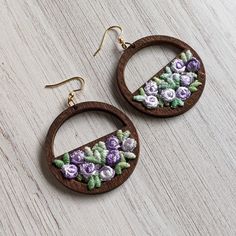 These delicate fabric flower earrings are the perfect look for anyone that loves flowers, nature, or gardening. They're from a stash of 1970s lavender purple and sage green fabric flowers that were never used for anything, the hoops are new lightweight wood, and the earwires are gold hypoallergenic stainless steel.  Details: Full length - 2 1/4 inches Width of wood hoop - 1 1/2 inches Hooks - hypoallergenic gold stainless steel Earring backing - clear rubber Gift boxes: Every piece of jewelry gets a cute decorative box, making it easy to give as a gift or keep for storage. Questions? Feel free to send me a message for custom requests, shipping details, and more. Spring Brown Jewelry Gift, Spring Gift Brown Jewelry, Brown Jewelry For Spring Gift, Bohemian Floral Embroidery Earrings For Gifts, Bohemian Floral Embroidered Earrings As Gift, Brown Flower-shaped Jewelry For Spring, Brown Flower-shaped Spring Jewelry, Brown Floral Jewelry For Spring, Handmade Vintage Earrings For Spring