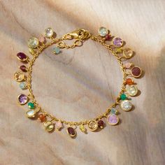 Ross-Simons - 10.80ct t. w. Multi-Gemstone Bead Station Bracelet Over Sterling. 7". We adore this fun, bubbly and vibrant bracelet! From an 18kt yellow gold over sterling silver cable chain, a multitude of stationed gems sparkle and sway with your every move. Features 10.80 ct. tot. gem wt. ruby, sky blue topaz, amethyst, prasiolite, citrine, apatite, garnet, peridot and rose quartz round beads. Also includes 3mm orange carnelian and green chalcedony round beads. Features a 1" extender. Lobster clasp, multi-gemstone bead station bracelet. Garnet birthstones are the perfect gift for January birthdays. Peridot Color, Garnet Birthstone, Quartz Colors, Green Chalcedony, Topaz Color, Peridot Stone, Amethyst Color, Green Peridot, Ruby Jewelry