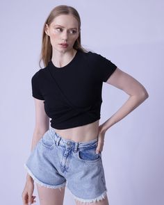 Rock the day in this slim-fit, casual twist front detailed crop top! Crafted from a cotton-spandex blend for medium stretch, you'll feel unstoppable! Throw it into the machine for a quick wash, or have it professionally dry cleaned! Trendy Stretch Tops With Twist Front, Trendy Fitted Tops With Twist Front, Trendy Stretch Top With Twist Front, Trendy Stretch Twist Front Tops, Trendy Spring Tops With Twist Front, Trendy Twist Front Tops For Spring, Spring Twist Front Trendy Tops, Trendy Fitted Top With Twist Front, Casual Stretch Twist Front Tops