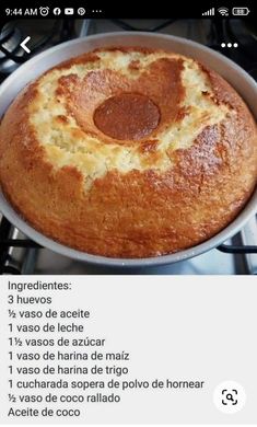 a cake in a pan sitting on top of a stove