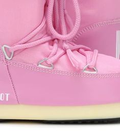 A beloved style reimagined for little ones, these snow boots from Moon Boot Kids have all the features fans of the brand know and love, from a technical nylon outer to sturdy rubber soles. A padded finish, unique lacing and contrasting branding gives this pink pair a strong look..Upper: fabric.Toe shape: round toe.Sole: fabric insole, rubber sole.Closure: lace-up.Designer color name: Pink.Lining: fabric.European sizes.Insole length size 23 = 14cm-5.5'.Insole length size 27 = 17cm-6.5'.Insole len Winter Nylon Lace-up Sneakers, Nylon Lace-up Winter Sneakers, Winter High-top Nylon Sneakers, Winter Waterproof Nylon Sneakers, Waterproof Nylon Winter Sneakers, Waterproof Nylon Sneakers For Winter, Trendy Pink Winter Sneakers, Moon Boot, Street Style Parisian